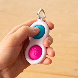 Juguete estimulación Simpl Dimpl